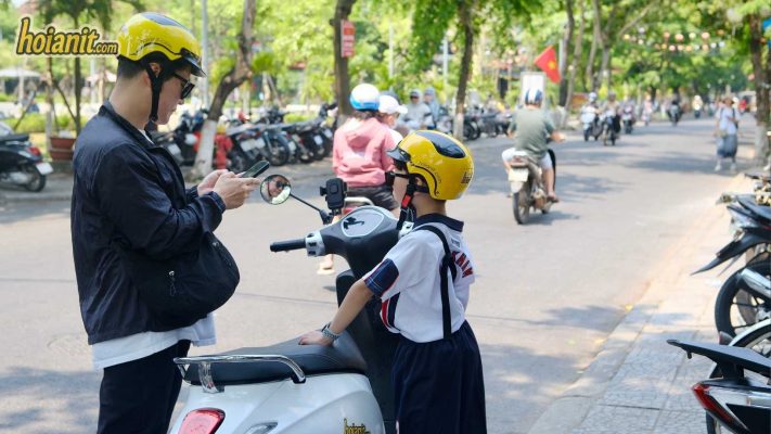 Can 3 people ride one motorbike in Vietnam with a baby
