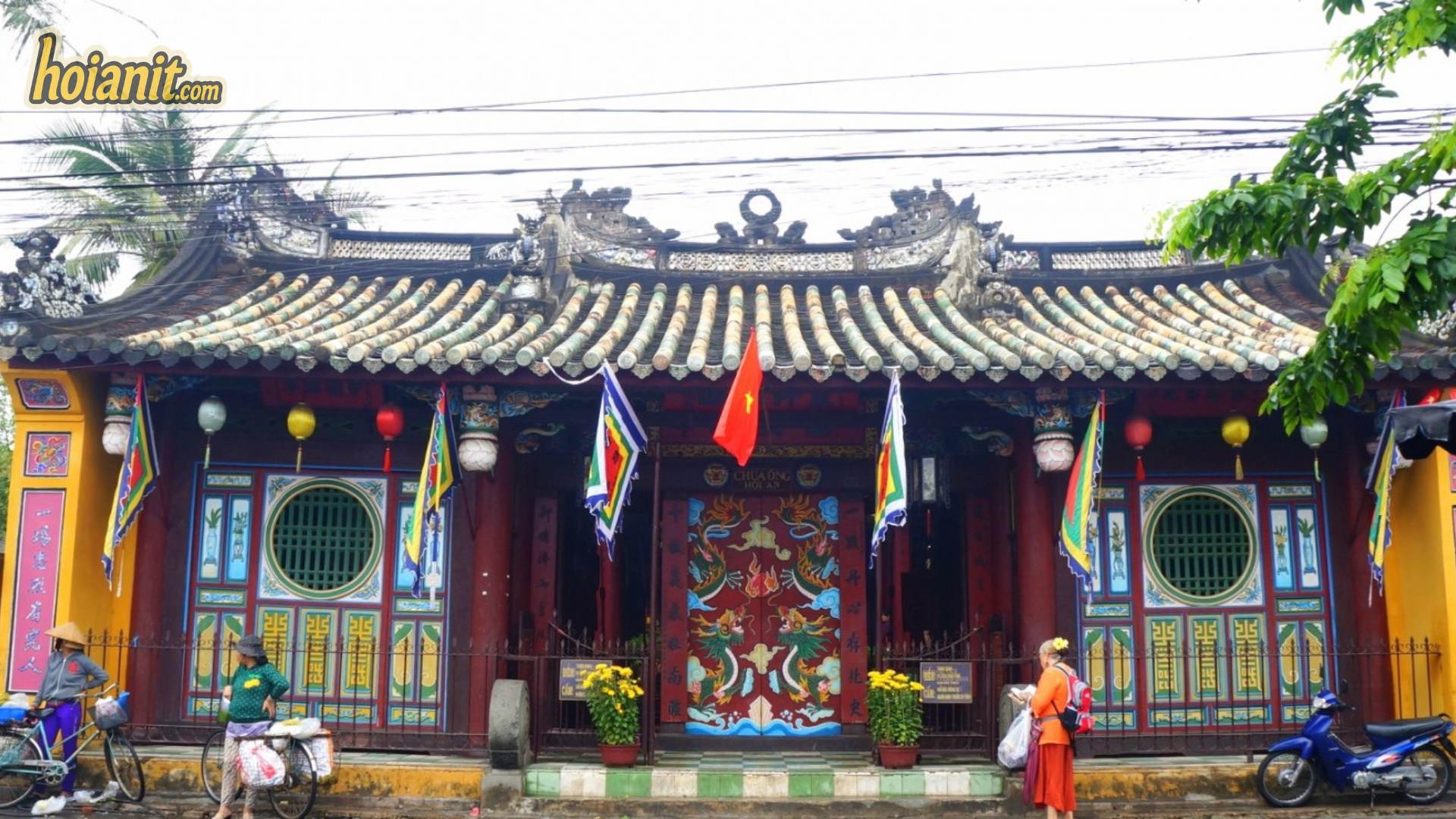 Chua Ong Pagoda Hoi An seen from Tran Phu street, glazed tile roof and painted central doors