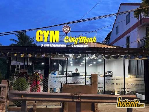 Street frontage and sign of Cong Manh Fitness, one of the cheapest gyms in Hoi An