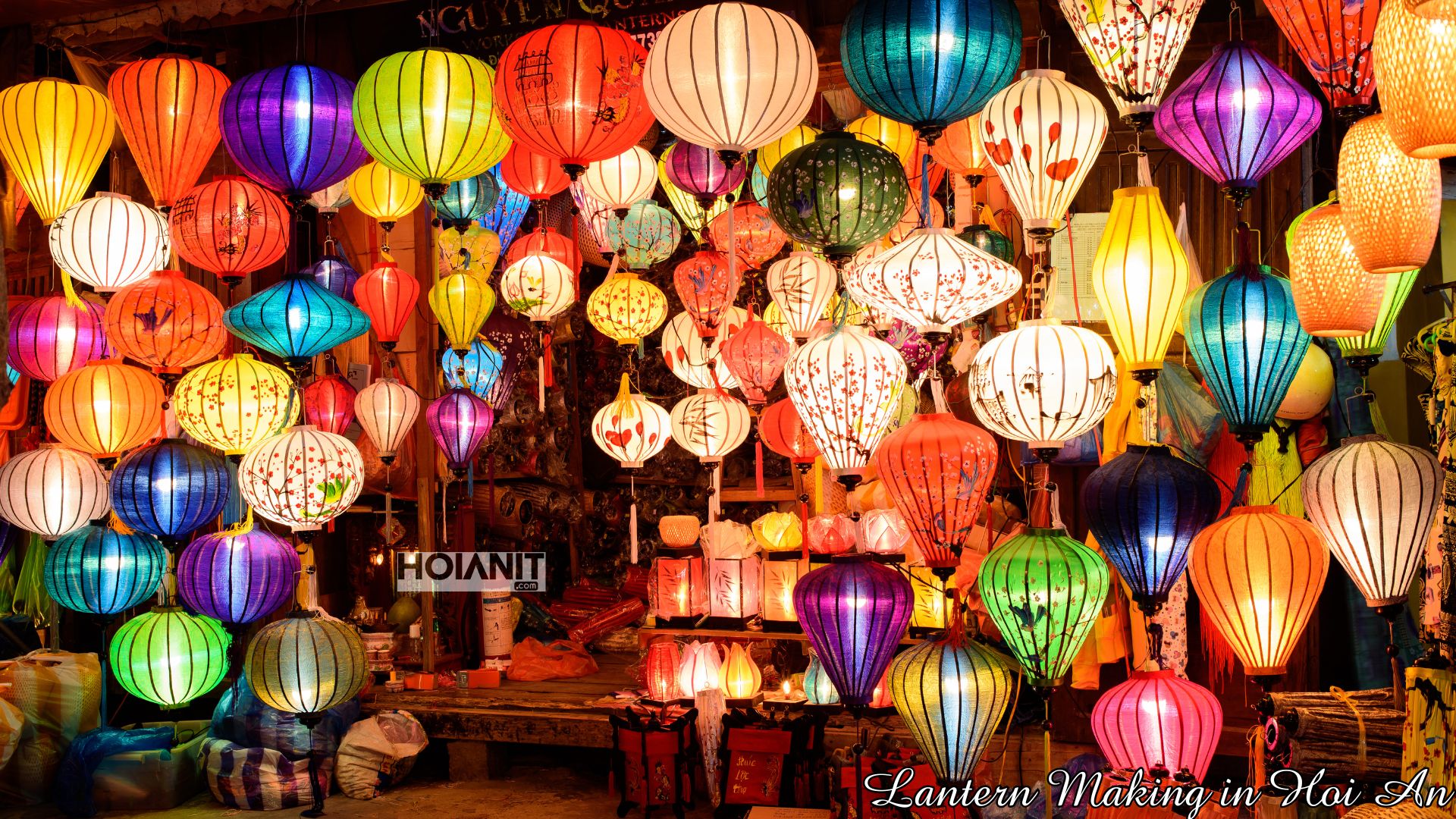 Silk lanterns of every colour hanging in a Hoi An lantern shop