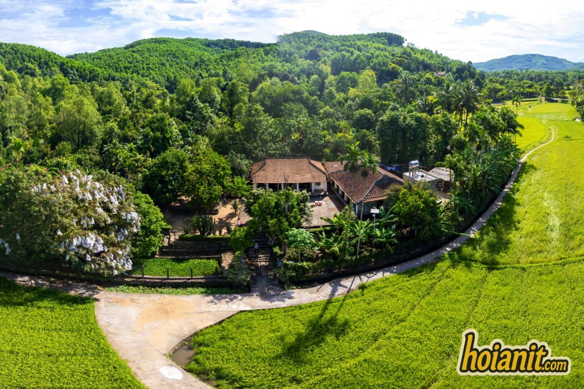 Loc Yen Aerial view of an old tiled-roof house among gardens and rice fields at Loc Yen ancient village, Tien Phuoc