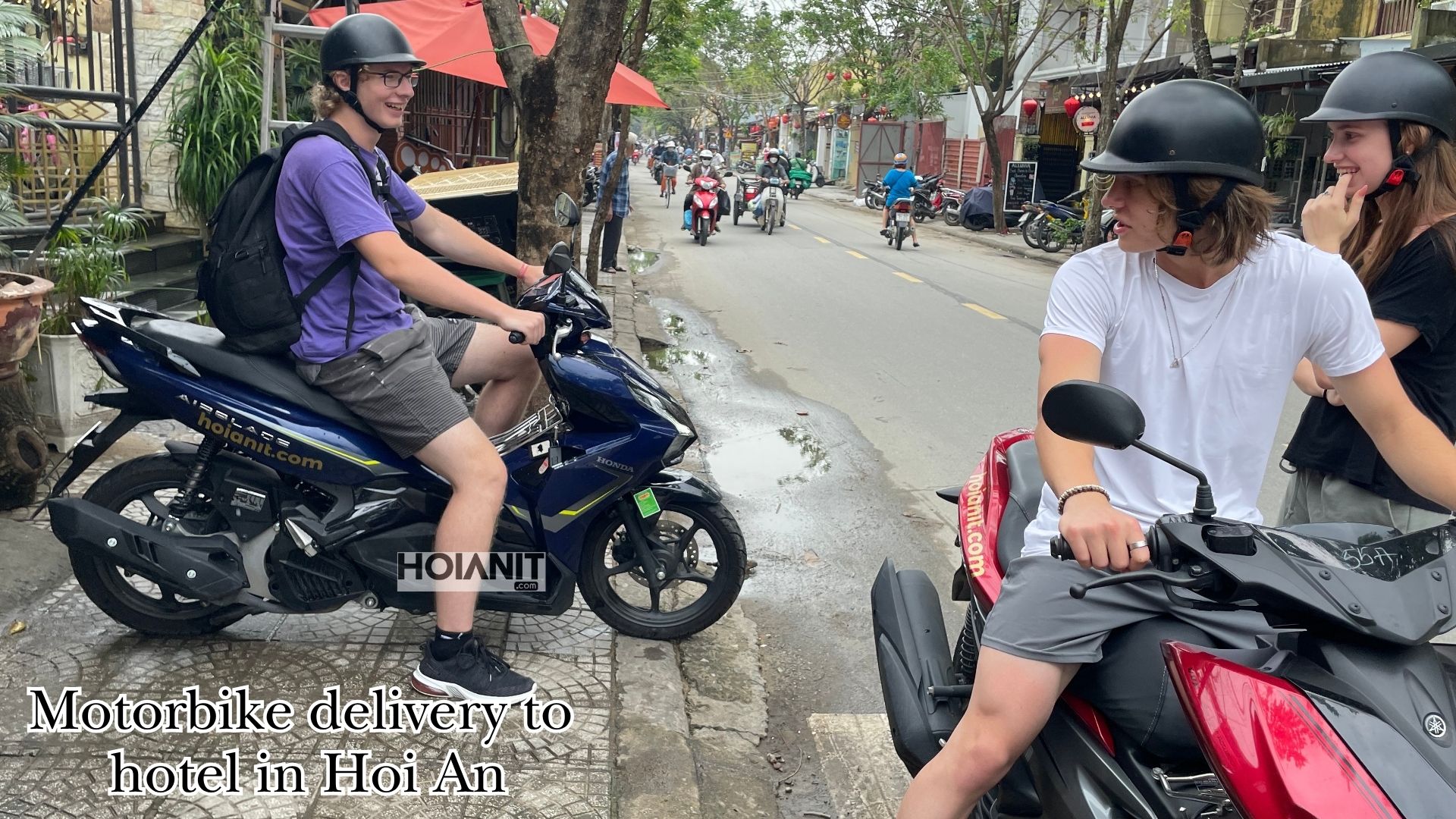 Motorbike rental Hoi An FAQ: travellers collecting delivered bikes on a Hoi An street