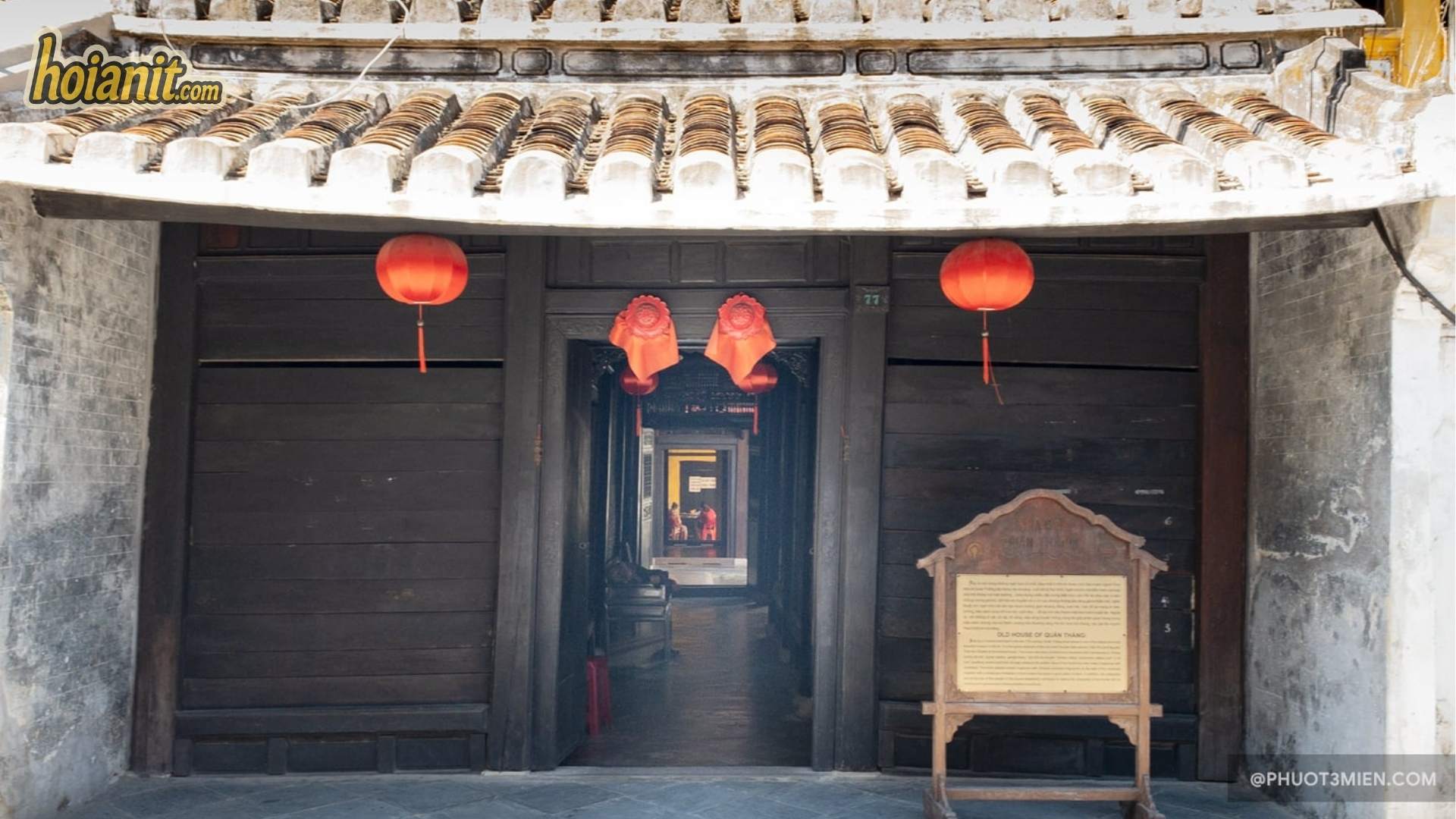 Interior timber frame and sky well of Quan Thang Ancient House in Hoi An