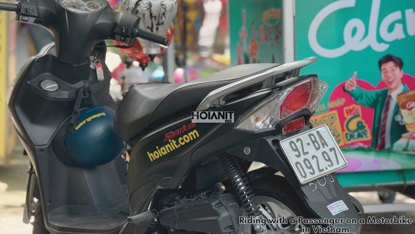 riding safely with a friend on a motorbike in Vietnam