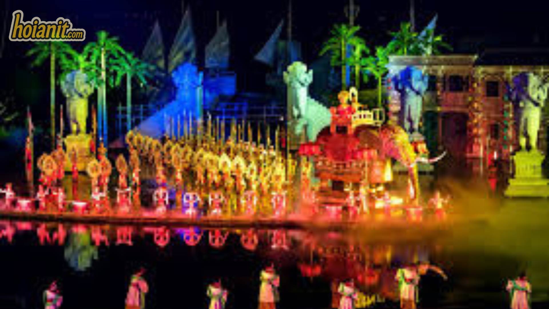 Performers in colour on the Hoi An Memories Show stage