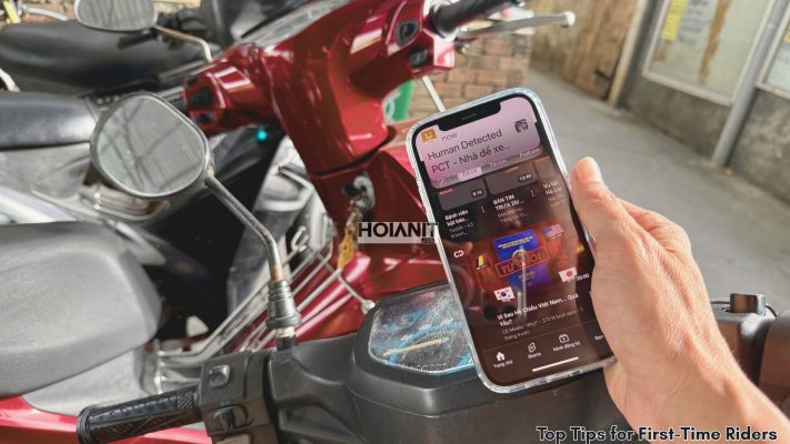 Tourist riding motorbike in Hoi An without distractions – how to ride a bike safely on the road