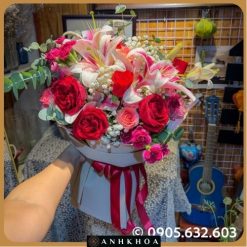 Lilies and roses bouquet in da nang flower shop