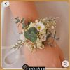 Hand-tied flower wrist corsage featuring yellow roses, white roses, and baby's breath from Hoi An