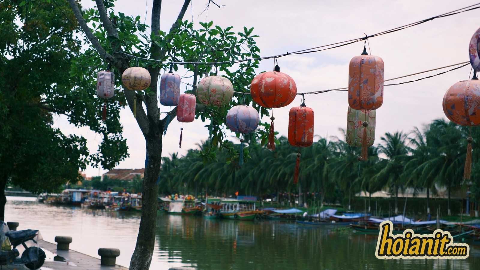 Silk lanterns over the Thu Bon River on a summer evening in Hoi An