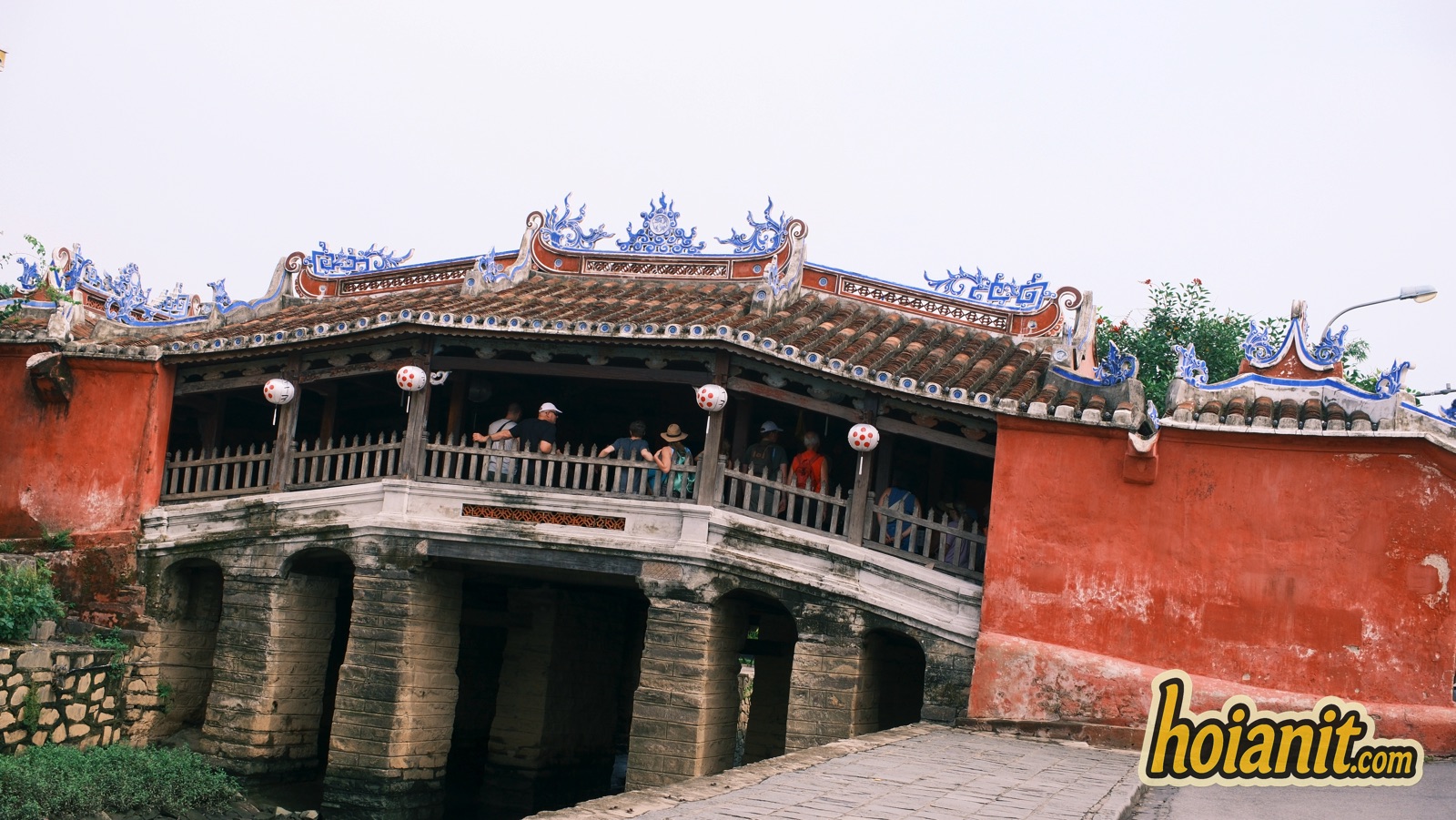 japanese bridge hoi an chua cau3 The Japanese Covered Bridge in Hoi An seen from the side, showing its stone piers and tiled roof
