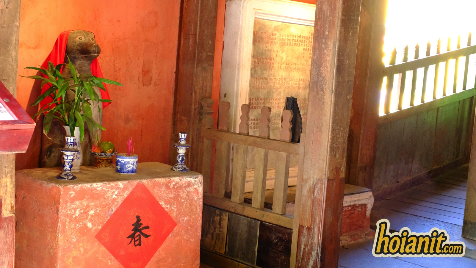 japanese covered bridge13 Small red offering shrine with a plant and the character for Spring inside the Japanese Covered Bridge