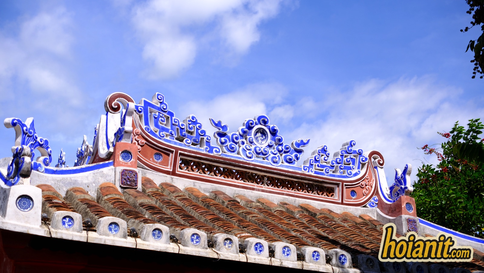 japanese covered bridge15 Close-up of the restored roof ridge of the Japanese Covered Bridge against a blue sky