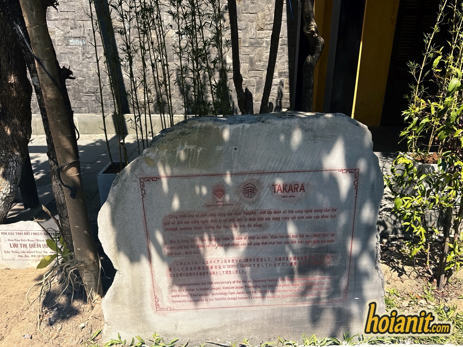 Stone tablet about the TAKARA public restroom at Kazik Park Hoi An