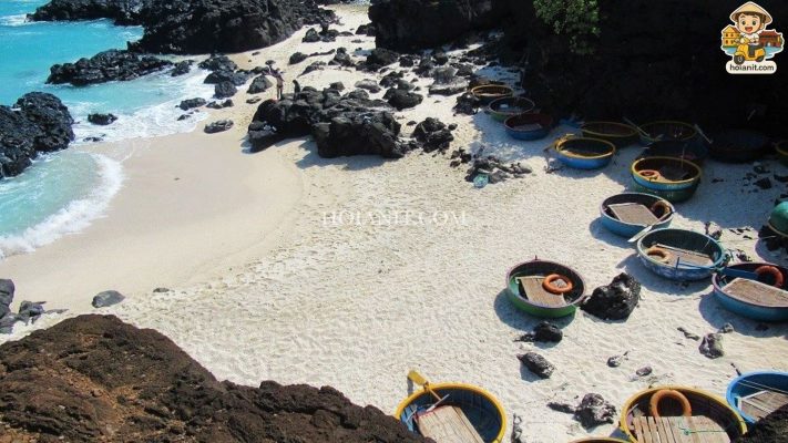 Crystal clear water and rocky coastline of Ly Son Volcanic cliffs and blue sea at Ly Son Island