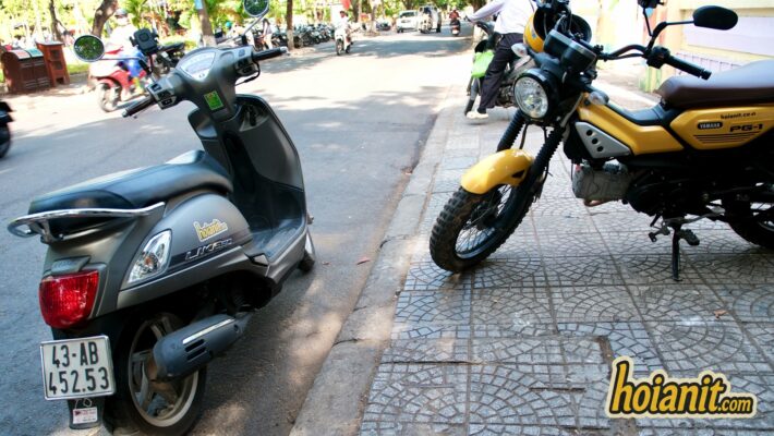 Scooter and motorbike parked Hoi An street