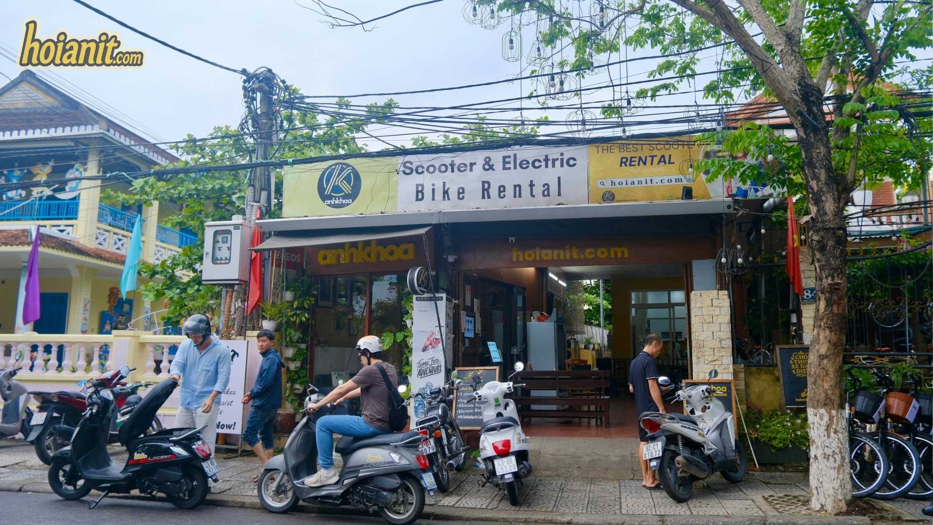 Hai Van Pass motorbike rental in Hoi An — riders collecting a scooter before the ride